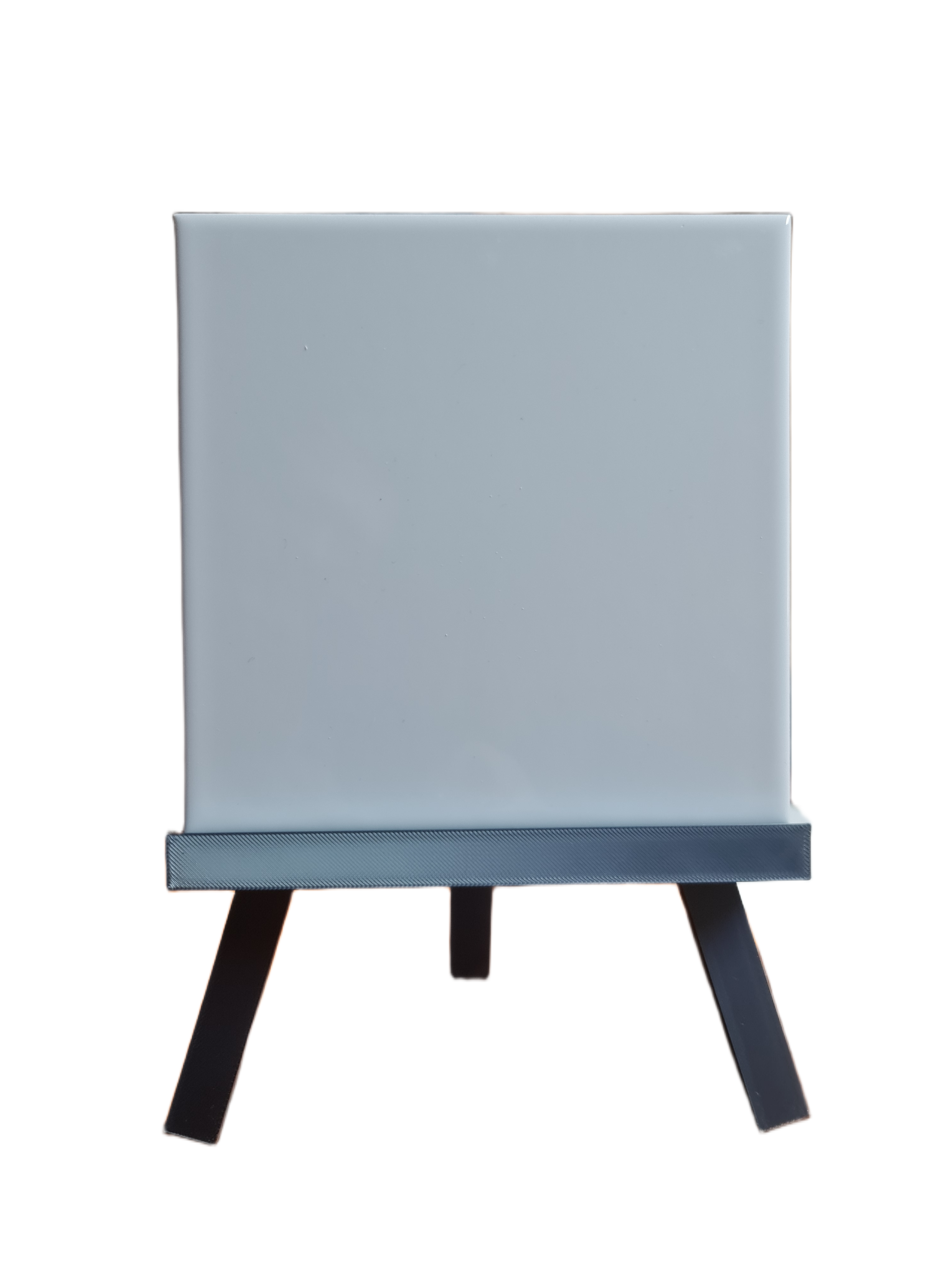 Blank grey metal plaque on a small black easel, Acier Manufacturing Limited