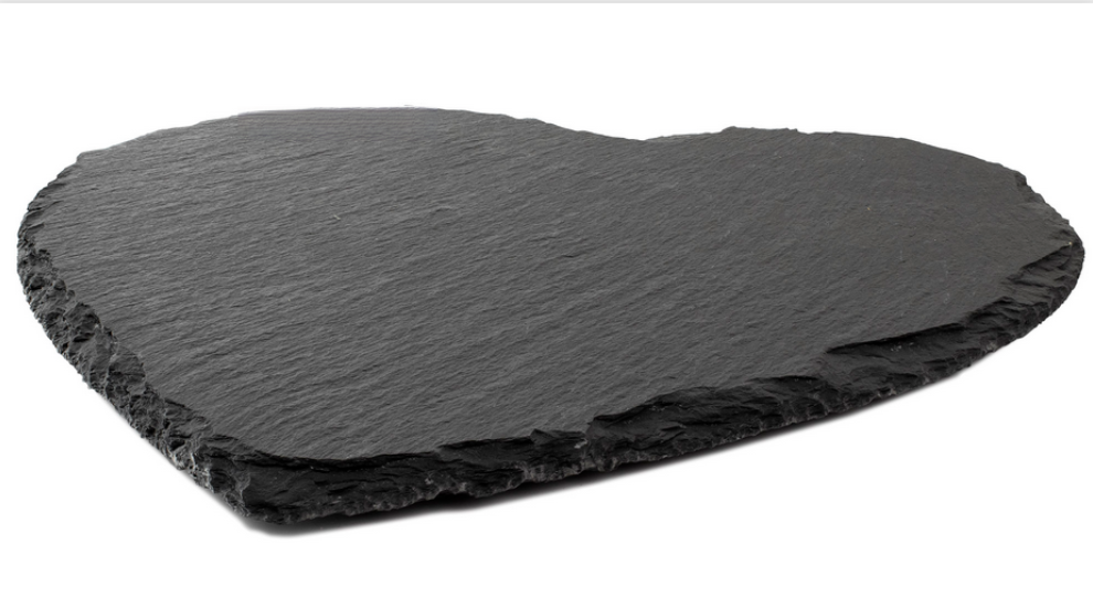 Heart-shaped black slate placemat with rough edges, Acier Manufacturing Limited