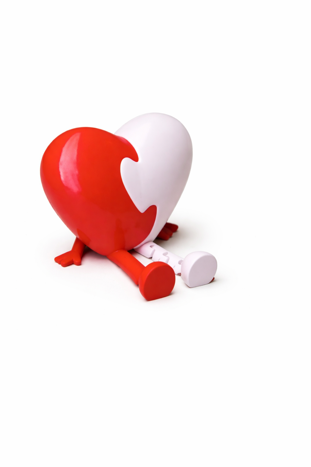 Red and white heart-shaped figurine with legs, Acier Manufacturing Limited product photo