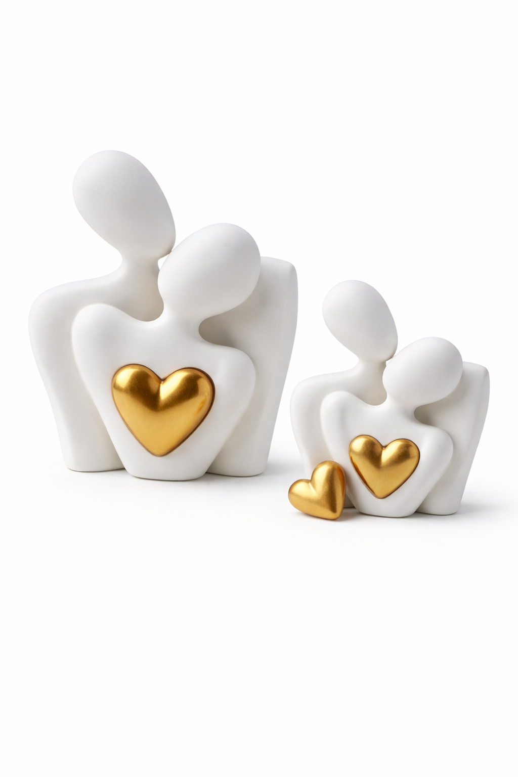 Modern white family figurines with gold heart decor on a white background, Acier Manufacturing