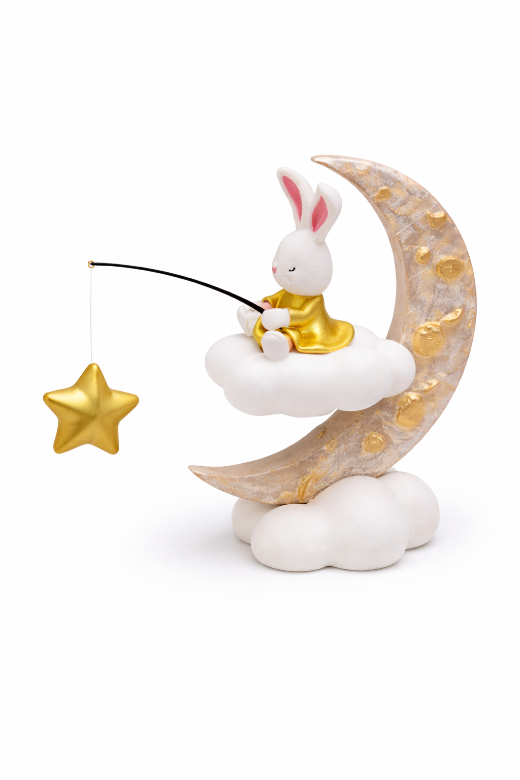 Cute ceramic bunny in gold outfit fishing for star on white cloud with crescent moon decor